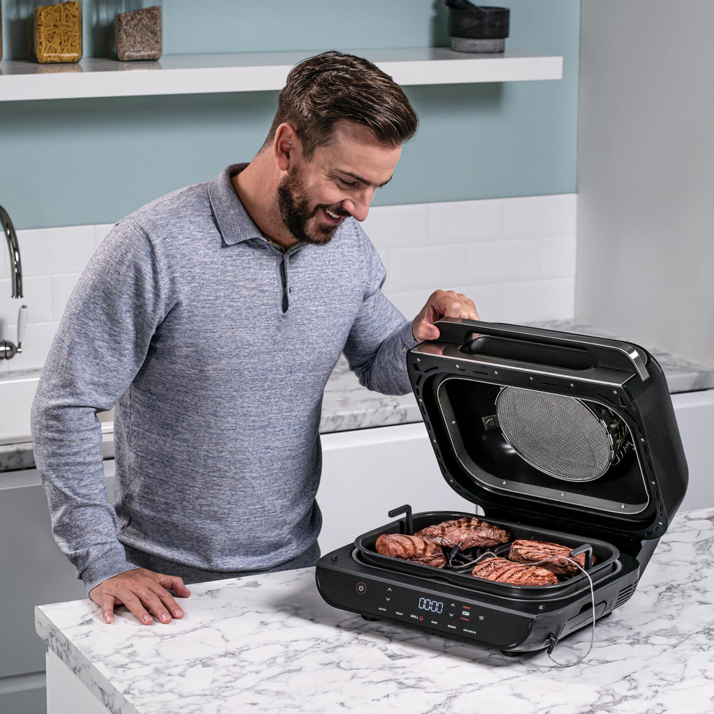 Ninja Foodi Grill i Frytkownica beztluszczowa, 5,7 l, smażenie bez oleju, grilowanie, pieczenie, ciasta i więcej, 5 funkcji gotowania, części bezpieczne do mycia w zmywarce, czarno/srebrna, AG301EU