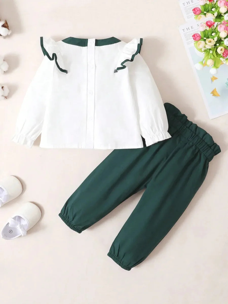 Toddler two-piece cotton outfit with bow and ruffles