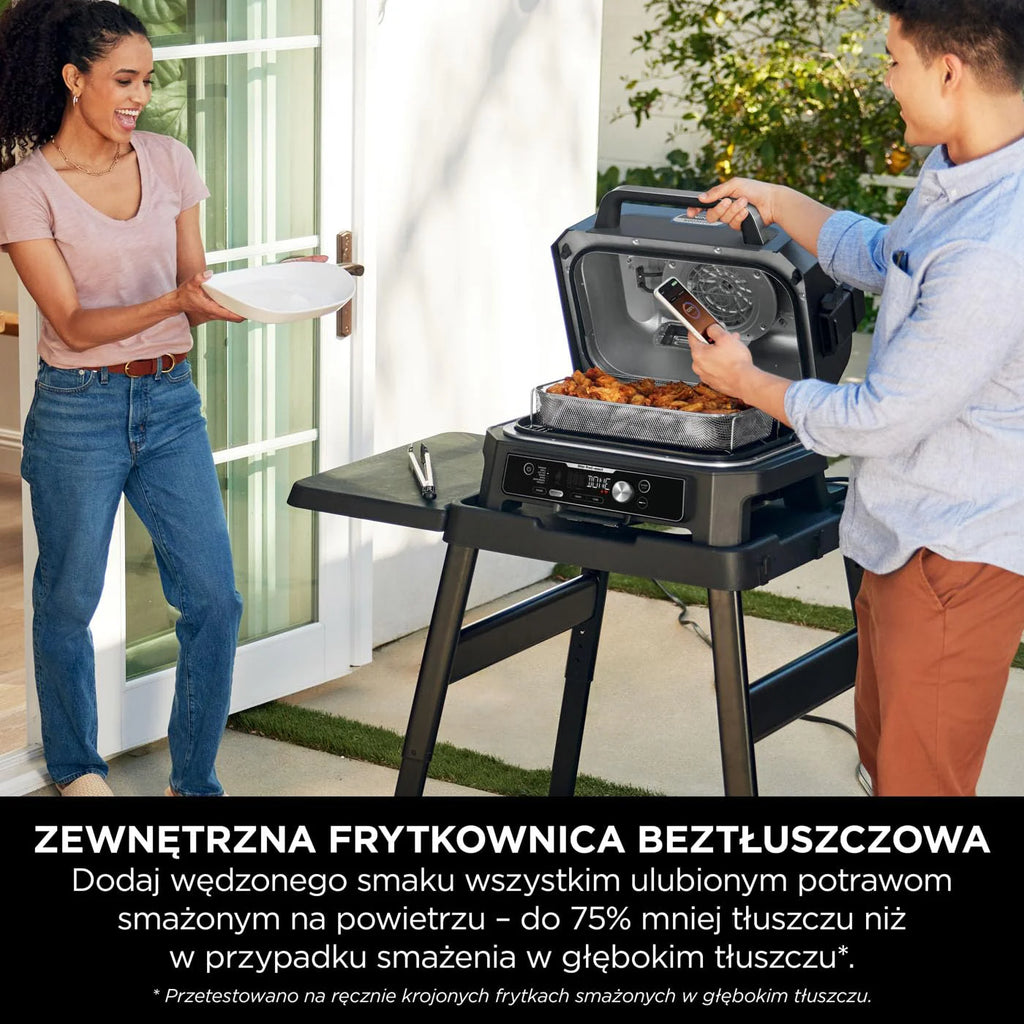 Ninja Woodfire Grill elektryczny, wędzarnia i frytkownica beztłuszczowa, 7 w 1, zewnętrzny, wędzenie, opiekanie, ciasta, odporny na pogodę, nieprzywierający, przenośny, szary/czarny OG701EU