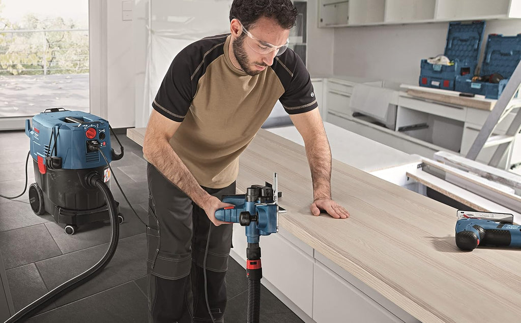 Bosch Professional: odkurzacz do pracy na sucho i mokro GAS 35 L AFC (1 200 W, 3 rury chromowane, wąż 5 m, zestaw dysz podłogowych, 1 filtr płaski fałdowany, worek na pył)