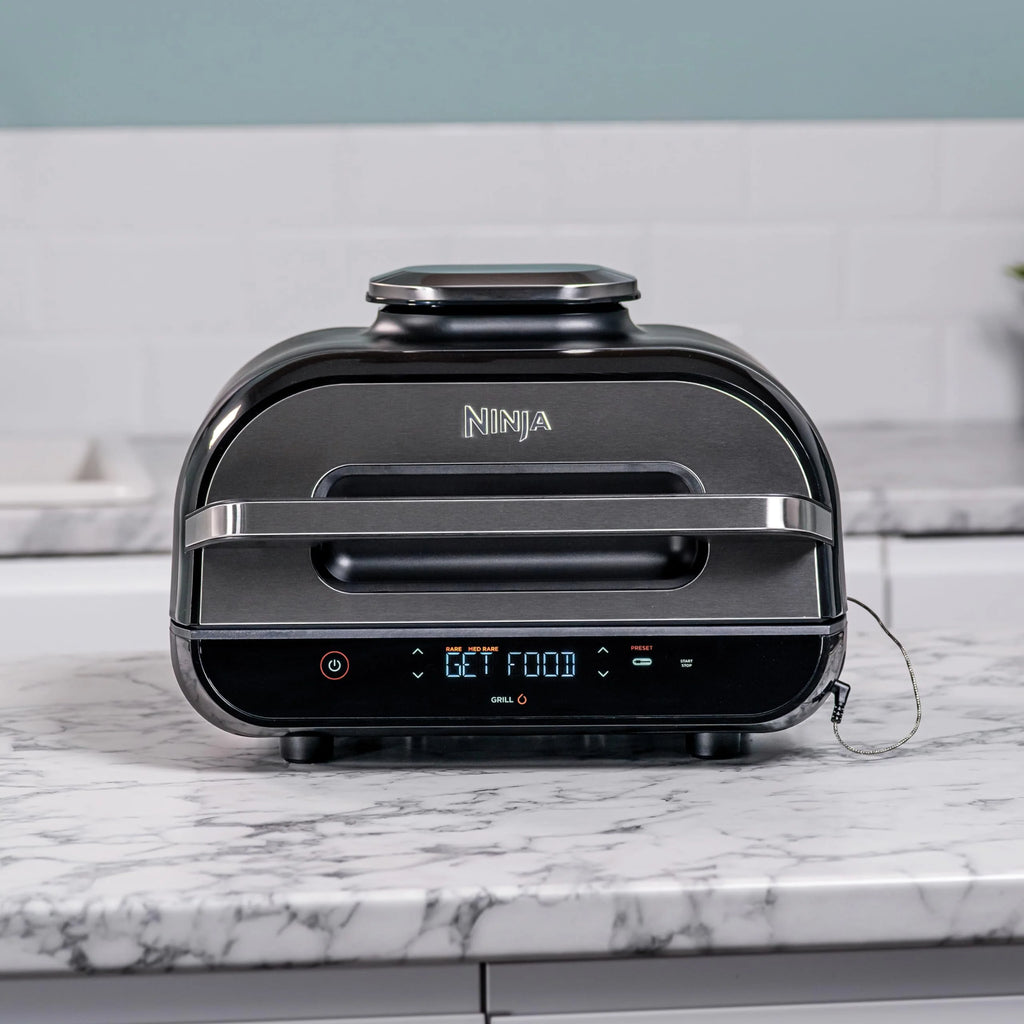 Ninja Foodi Grill i Frytkownica beztluszczowa, 5,7 l, smażenie bez oleju, grilowanie, pieczenie, ciasta i więcej, 5 funkcji gotowania, części bezpieczne do mycia w zmywarce, czarno/srebrna, AG301EU