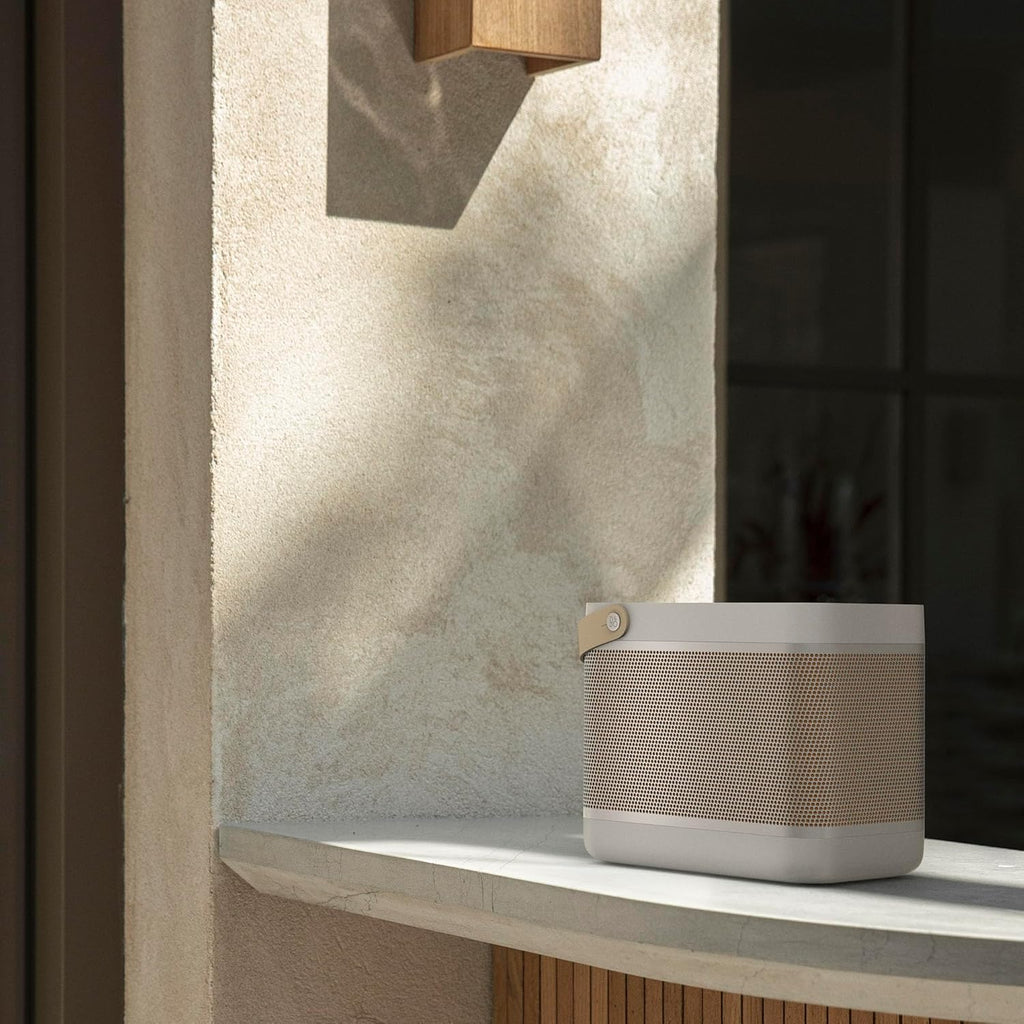 Bang & Olufsen Beolit 20 Przenośny głośnik z bluetooth, z ładowaniem bezprzewodowym, głośny dźwięk 360 stopni, głośnik do domu i na zewnątrz, ładowarka Qi do telefonu - Grey Mist