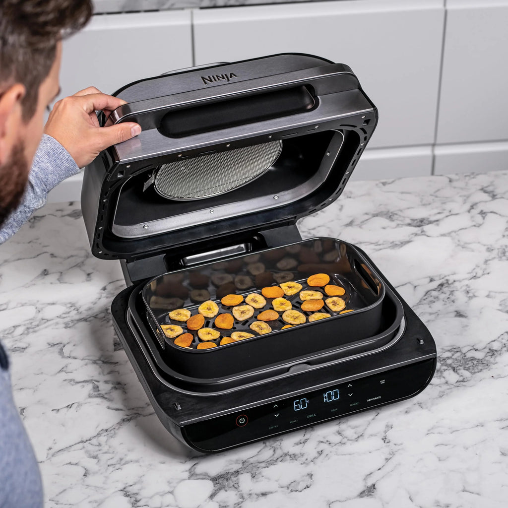 Ninja Foodi Grill i Frytkownica beztluszczowa, 5,7 l, smażenie bez oleju, grilowanie, pieczenie, ciasta i więcej, 5 funkcji gotowania, części bezpieczne do mycia w zmywarce, czarno/srebrna, AG301EU