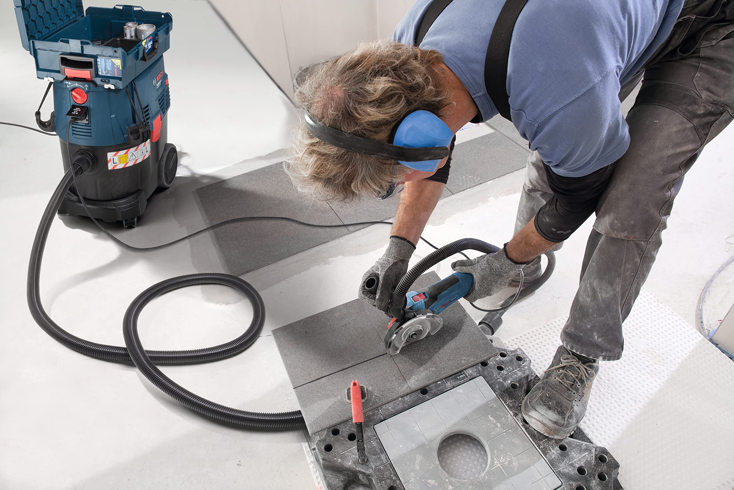 Bosch Professional: odkurzacz do pracy na mokro i sucho GAS 35 L SFC+ (1 200 W, 3 rury chromowane, wąż 3 m, zestaw dysz podłogowych, 1 filtr płaski fałdowany, worek na pył)