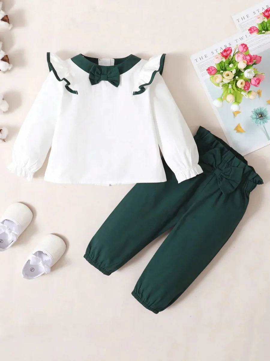 Toddler two-piece cotton outfit with bow and ruffles