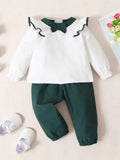 Toddler two-piece cotton outfit with bow and ruffles