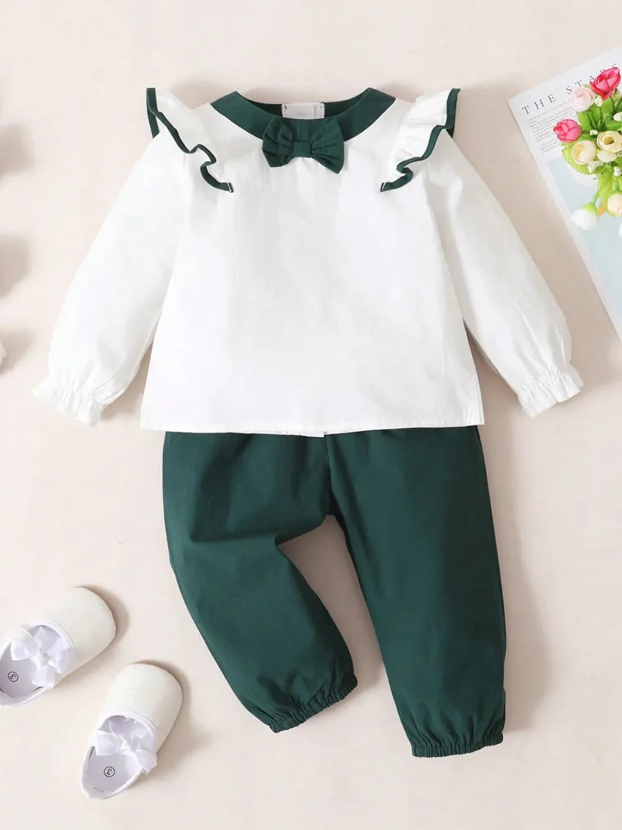 Toddler two-piece cotton outfit with bow and ruffles